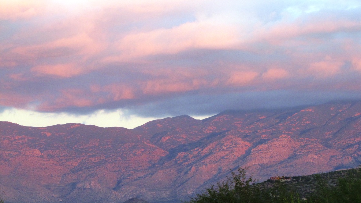 Picture of Tucson sunrise over the mountains from dad's yard